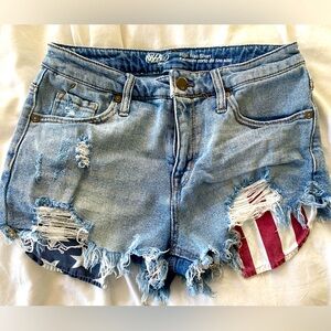 High rise, distressed denim shorts with American flag pockets